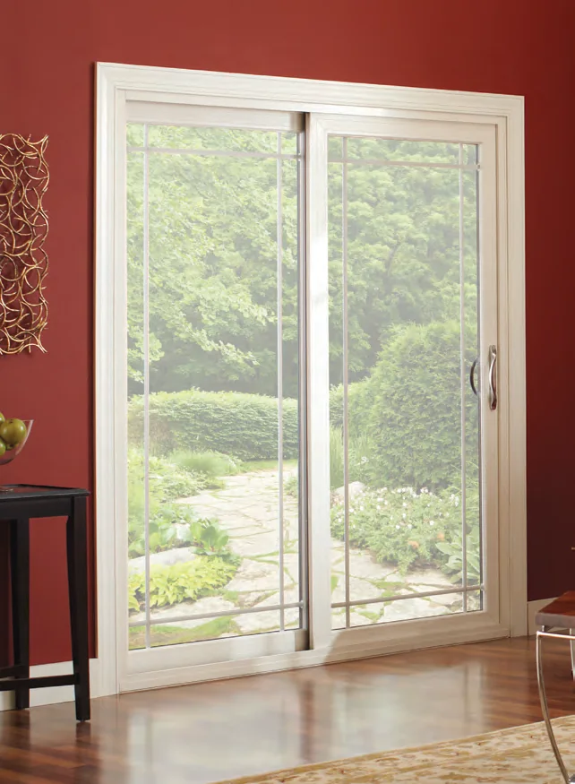 White contemporary sliding patio door with slim rails in a red walled room