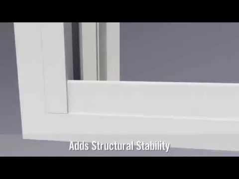 Corner of a white window frame showing the telescoping sill